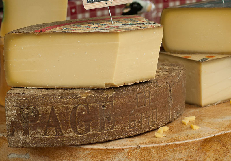 Wheels of cheese shared at the cheese sharing in Stechelberg, Switzerland