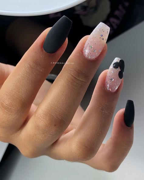 Rounded on the sides but square on the top make these coffin nails modern and chic. These come with an elegant nod to the Mouse on the party fingernail. Combined with matte black and glittery shades, these nails are perfect for formal night on a Disney cruise!  
