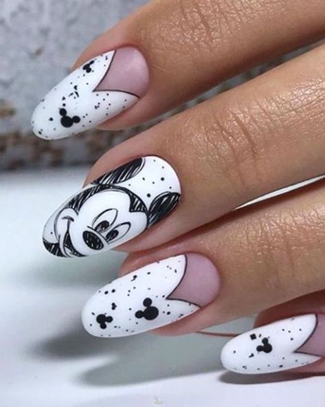 These nails nod to vintage Disney animation with their black-and-white, sketched look.