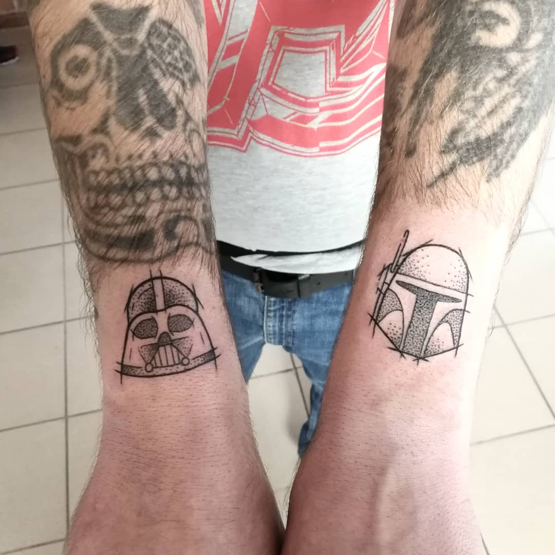 sketch of Boba Fett and Darth Vader tattoos