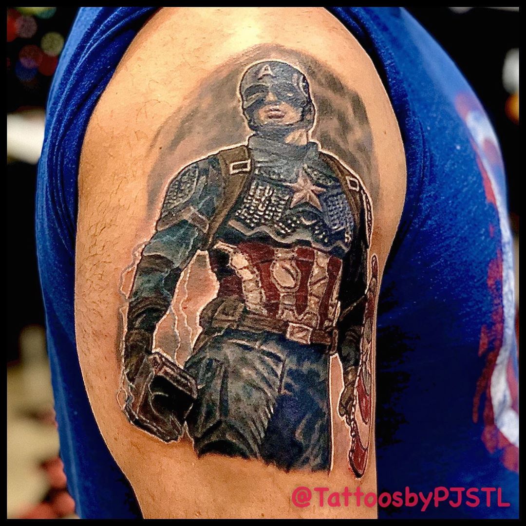 Captain America holding Thor's hammer tattoo