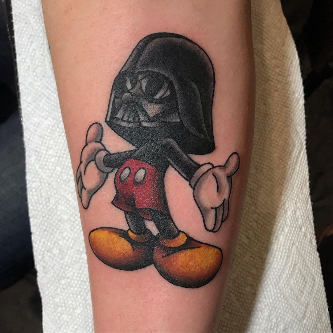 Mickey Mouse body with Darth Vader head tattoo