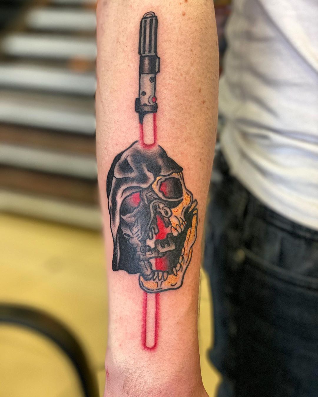 Darth Vader gruesome lightsaber tattoo