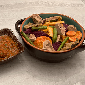 bowl of vegetable chips and sauce