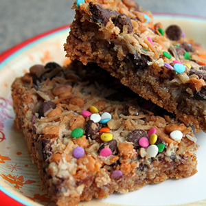 magic cookie bars on a plate