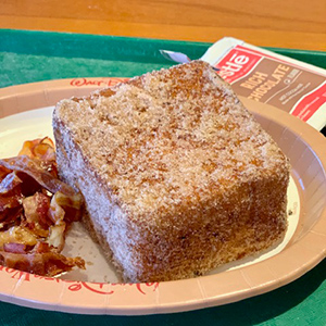 a slice of sourdough bread that has been made into french toast and stuffed with bananas