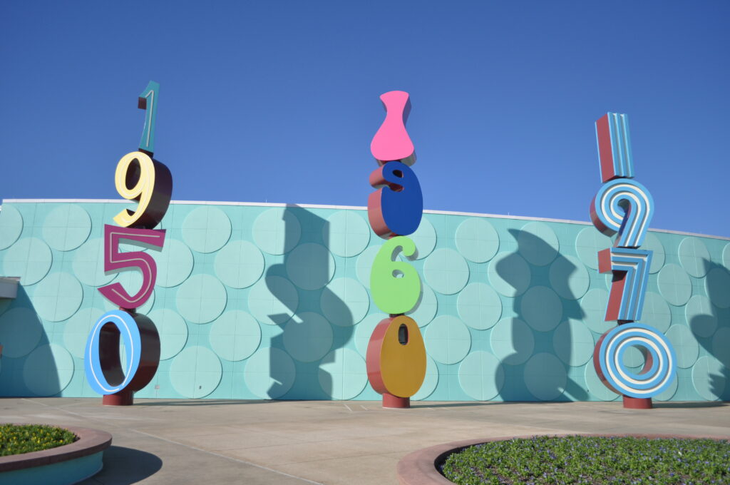 signs with decades outside Pop Century resort