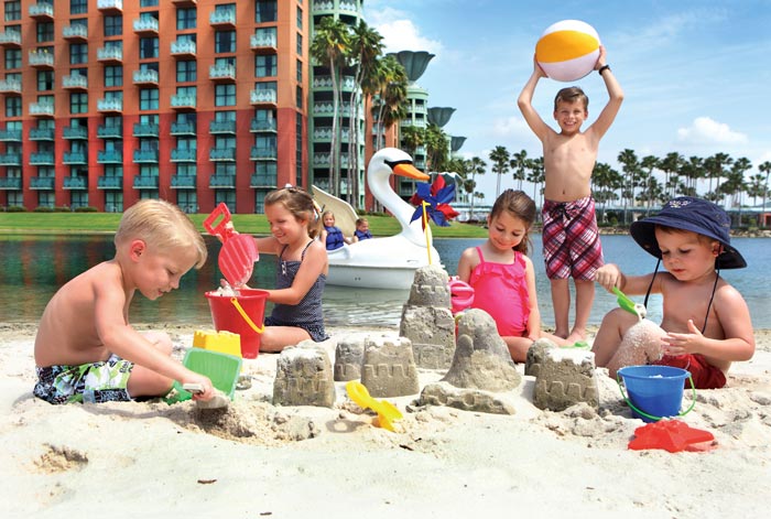 Kids at beach pool of Disney Dolphin hotel